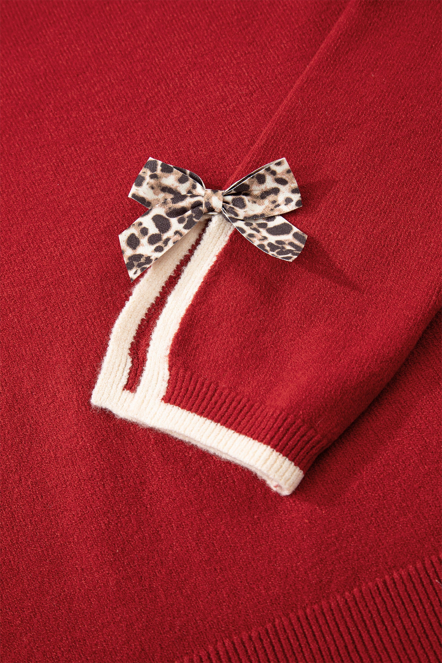 Black Leopard Bow Decor Split Cuff Contrast Trim Sweater